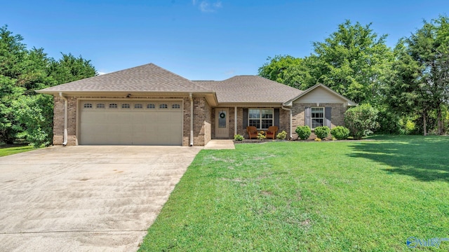 24147 Jacobs Dr, Athens, AL 35613 - ranch-style home with an attached garage, brick siding, driveway, a front lawn, and a shingled roof