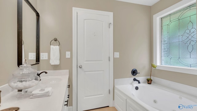 24147 Jacobs Dr, Athens, AL 35613 - full bathroom featuring a whirlpool tub and vanity