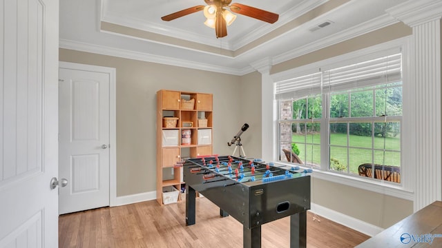 24147 Jacobs Dr, Athens, AL 35613 - playroom featuring baseboards, wood finished floors, a raised ceiling, ceiling fan, and ornamental molding