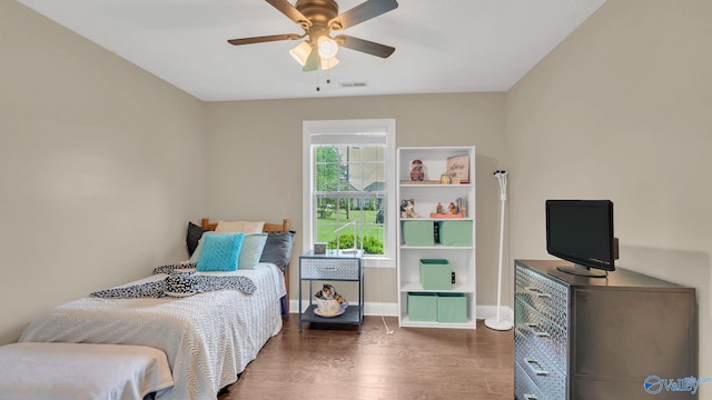 24147 Jacobs Dr, Athens, AL 35613 - bedroom featuring wood finished floors, baseboards, and ceiling fan