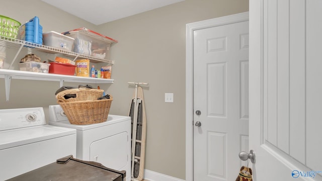 24147 Jacobs Dr, Athens, AL 35613 - washroom featuring independent washer and dryer and baseboards