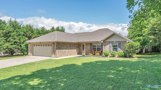 24147 Jacobs Dr, Athens, AL 35613 - single story home featuring a garage, a front yard, brick siding, and concrete driveway