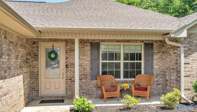 24147 Jacobs Dr, Athens, AL 35613 - view of exterior entry with roof with shingles and brick siding