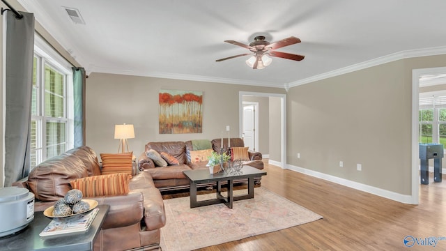 24147 Jacobs Dr, Athens, AL 35613 - living room with ceiling fan, baseboards, light wood-type flooring, and ornamental molding