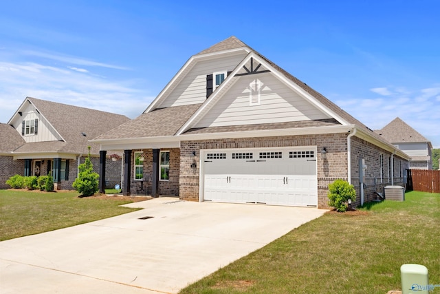craftsman-style home featuring fence, roof with shingles, a front lawn, brick siding, and concrete driveway