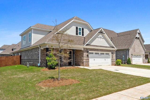 craftsman-style home featuring brick siding, driveway, fence, and a front lawn