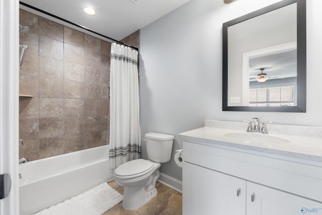 full bathroom with ceiling fan, shower / bath combination with curtain, vanity, baseboards, and toilet