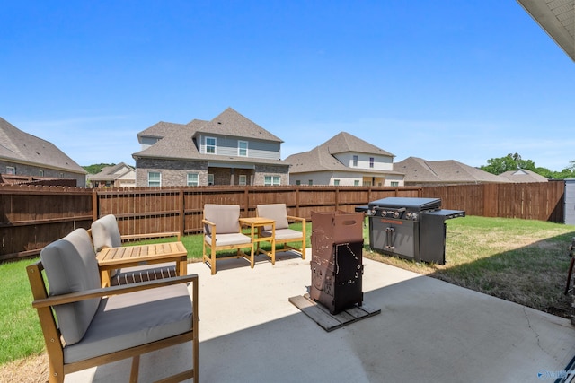 view of patio / terrace with outdoor lounge area, a fenced backyard, and a grill