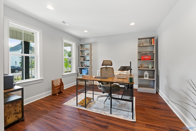 office featuring visible vents, recessed lighting, baseboards, and wood finished floors