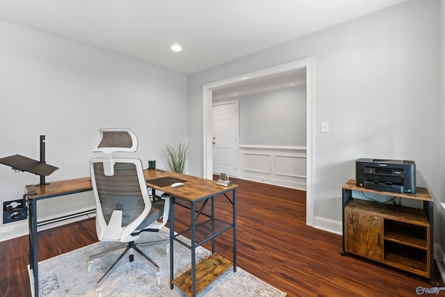 office area featuring baseboards, recessed lighting, wood finished floors, and a wainscoted wall