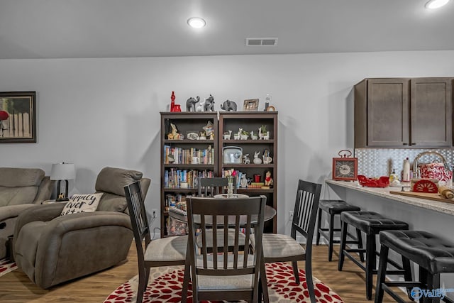 dining space featuring hardwood / wood-style floors