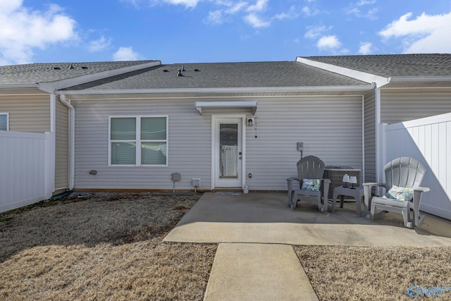 back of property featuring a patio