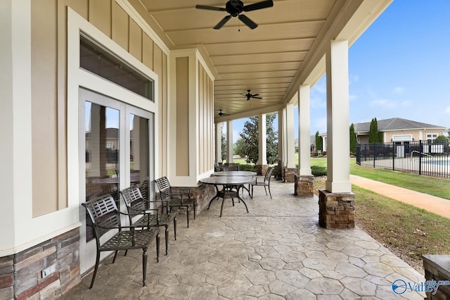 view of patio / terrace with french doors and ceiling fan