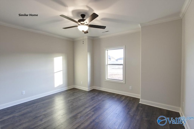 empty room with dark wood-style flooring, baseboards, visible vents, a ceiling fan, and crown molding