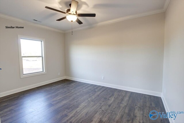 spare room featuring a ceiling fan, visible vents, ornamental molding, and dark wood-style flooring