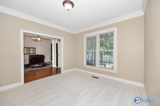 412 Clydebank Dr, Madison, AL 35758 - carpeted spare room with ornamental molding, baseboards, and a chandelier