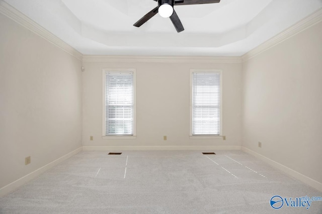 412 Clydebank Dr, Madison, AL 35758 - unfurnished room featuring a raised ceiling, ceiling fan, ornamental molding, carpet floors, and baseboards