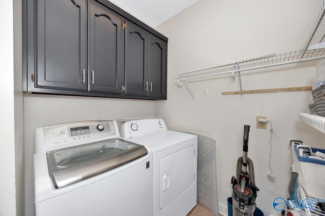 412 Clydebank Dr, Madison, AL 35758 - laundry room with cabinet space and washer and clothes dryer