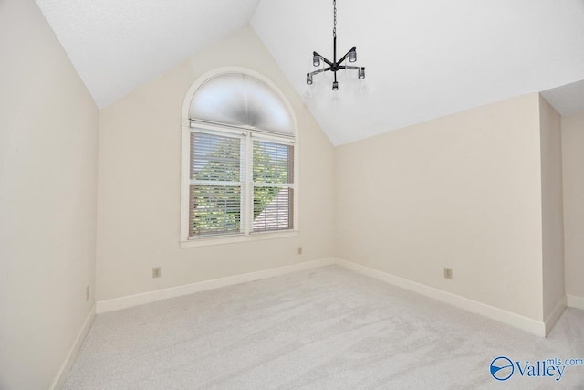 412 Clydebank Dr, Madison, AL 35758 - additional living space featuring vaulted ceiling, a chandelier, carpet, and baseboards