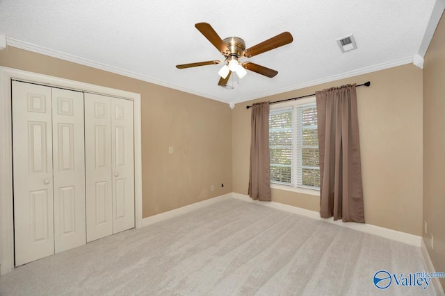 412 Clydebank Dr, Madison, AL 35758 - unfurnished bedroom with carpet floors, ornamental molding, baseboards, a closet, and a ceiling fan