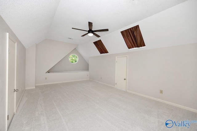 412 Clydebank Dr, Madison, AL 35758 - additional living space featuring a ceiling fan, carpet, lofted ceiling, and baseboards