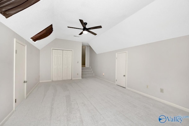 412 Clydebank Dr, Madison, AL 35758 - additional living space featuring a ceiling fan, light carpet, vaulted ceiling, and baseboards