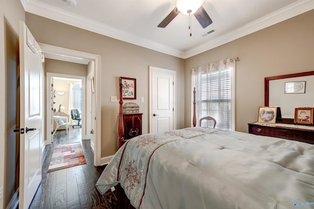 bedroom featuring ceiling fan, dark wood-type flooring, and crown molding