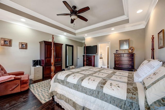 bedroom featuring ornamental molding, a raised ceiling, ceiling fan, and dark hardwood / wood-style floors