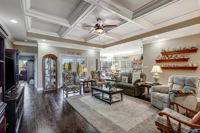 living room with ornamental molding, coffered ceiling, and plenty of natural light