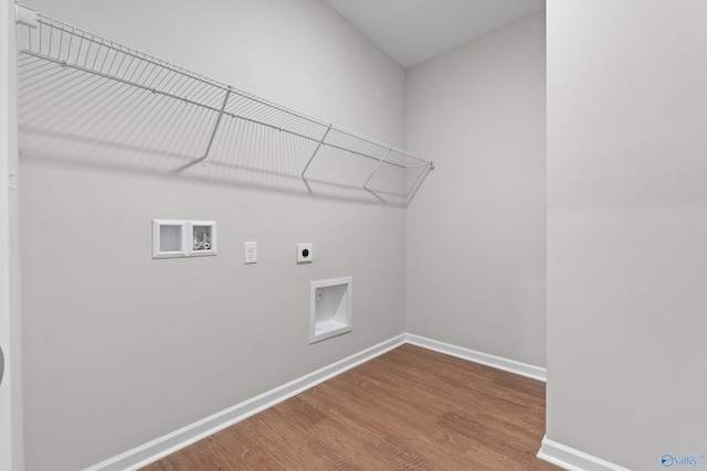 148 Aurora Cir, Fayetteville, TN 37334 - laundry area featuring electric dryer hookup, baseboards, wood finished floors, and washer hookup