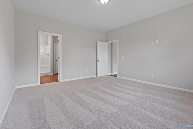 148 Aurora Cir, Fayetteville, TN 37334 - unfurnished bedroom featuring carpet flooring, baseboards, and ensuite bath