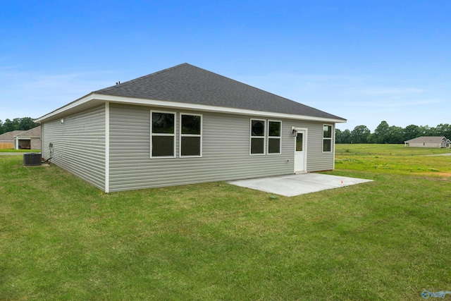 148 Aurora Cir, Fayetteville, TN 37334 - back of house with a patio area, roof with shingles, a lawn, and central air condition unit