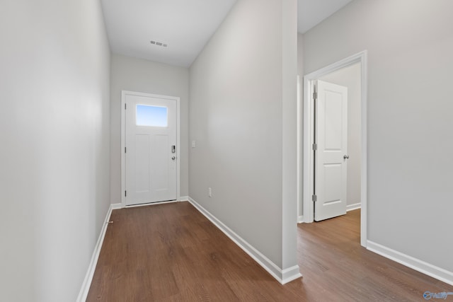 148 Aurora Cir, Fayetteville, TN 37334 - doorway to outside featuring dark wood-style flooring and baseboards
