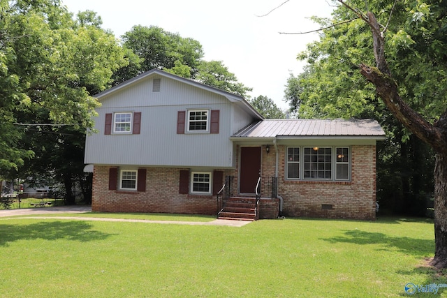 3703 Fox Trail Cir, Huntsville, AL 35810 - tri-level home featuring brick siding, a front yard, metal roof, and crawl space