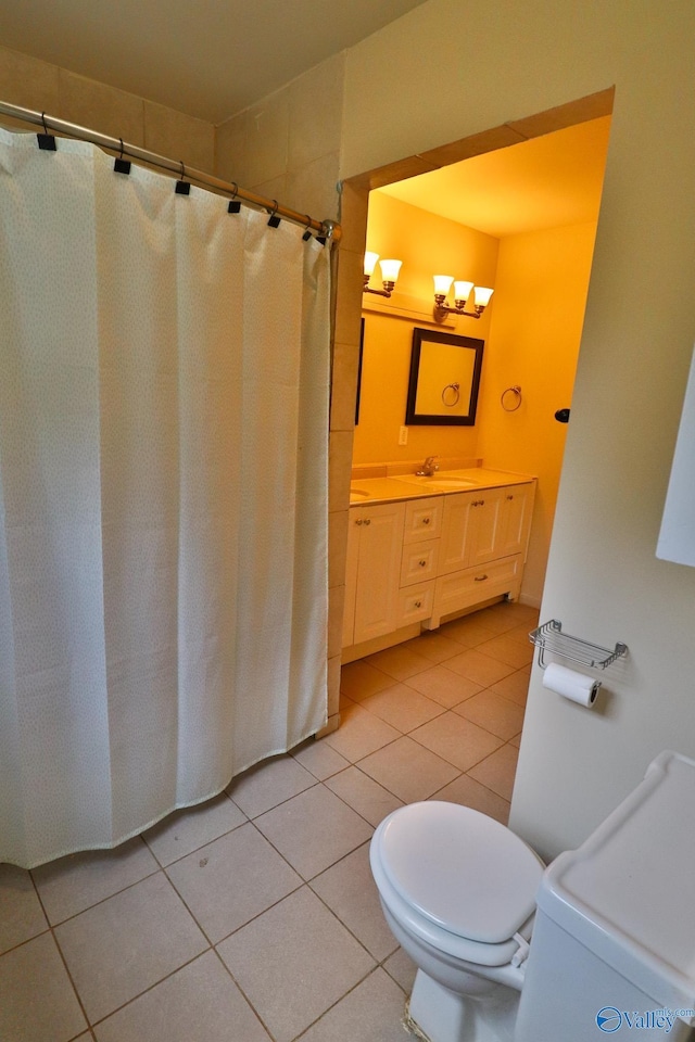 3703 Fox Trail Cir, Huntsville, AL 35810 - bathroom with toilet, tile patterned floors, vanity, and curtained shower
