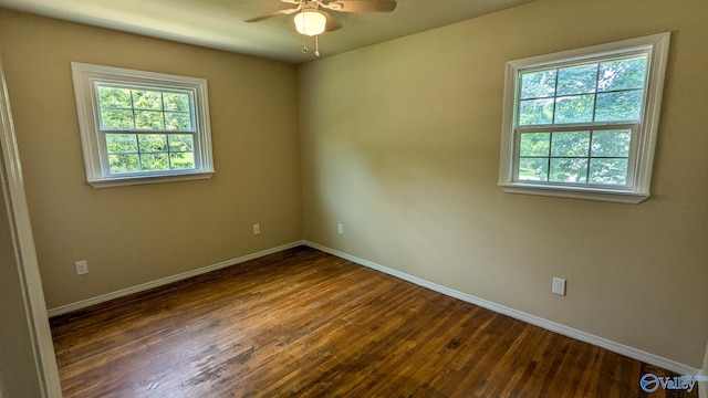 3703 Fox Trail Cir, Huntsville, AL 35810 - unfurnished room with plenty of natural light, baseboards, a ceiling fan, and wood finished floors