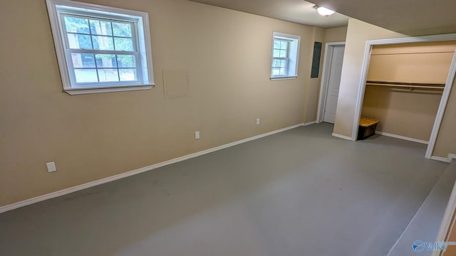 3703 Fox Trail Cir, Huntsville, AL 35810 - unfurnished bedroom with baseboards, finished concrete flooring, and a closet