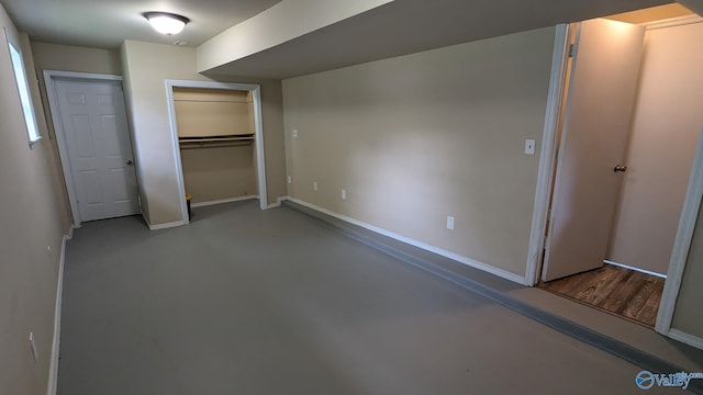 3703 Fox Trail Cir, Huntsville, AL 35810 - unfurnished bedroom with finished concrete floors and baseboards