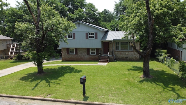 3703 Fox Trail Cir, Huntsville, AL 35810 - split level home with brick siding and metal roof