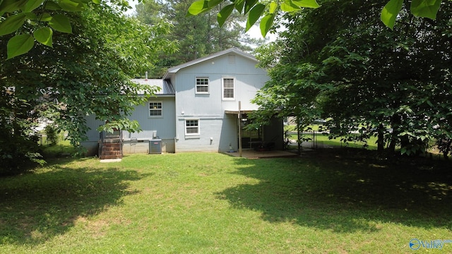 3703 Fox Trail Cir, Huntsville, AL 35810 - view of grassy yard with central air condition unit and a patio