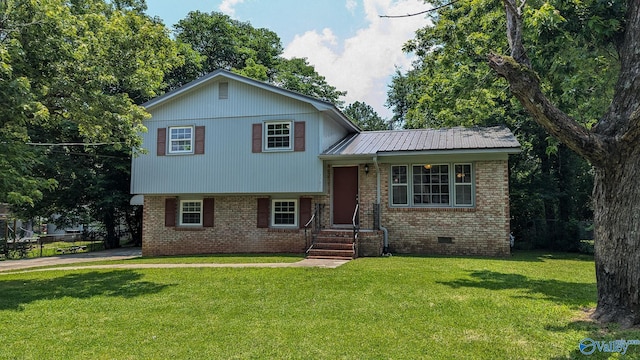 3703 Fox Trail Cir, Huntsville, AL 35810 - tri-level home featuring brick siding, a front yard, metal roof, and crawl space