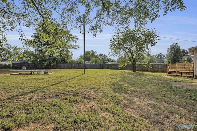 view of yard featuring a deck