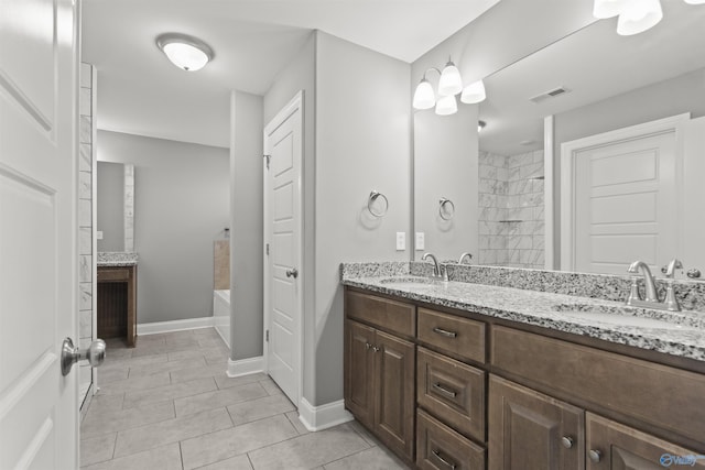 full bath featuring double vanity, a garden tub, visible vents, and a sink