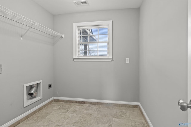 washroom featuring laundry area, electric dryer hookup, baseboards, and visible vents