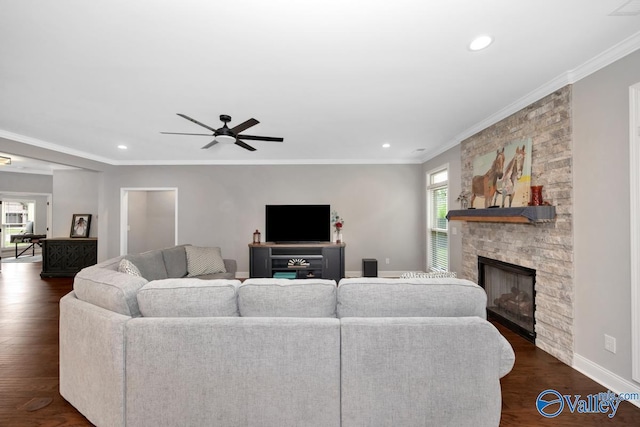 7528 Flint Crossing Cir, Owens Cross Roads, AL 35763 - living room with recessed lighting, a ceiling fan, a stone fireplace, dark wood-type flooring, and crown molding