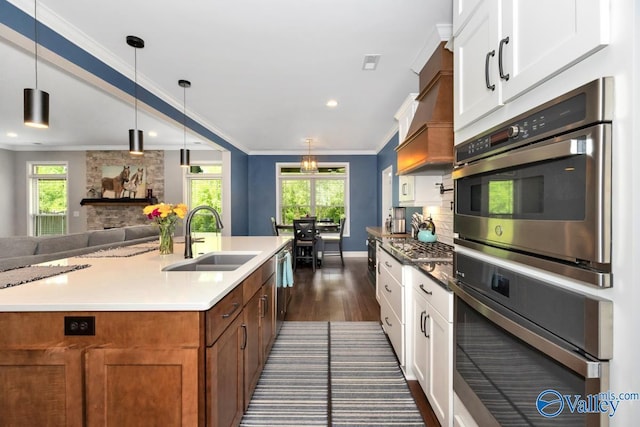 7528 Flint Crossing Cir, Owens Cross Roads, AL 35763 - kitchen featuring dark wood-type flooring, stainless steel double oven, plenty of natural light, white cabinets, and recessed lighting