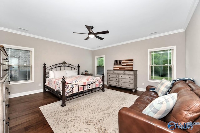 7528 Flint Crossing Cir, Owens Cross Roads, AL 35763 - bedroom featuring dark wood-type flooring, crown molding, and ceiling fan