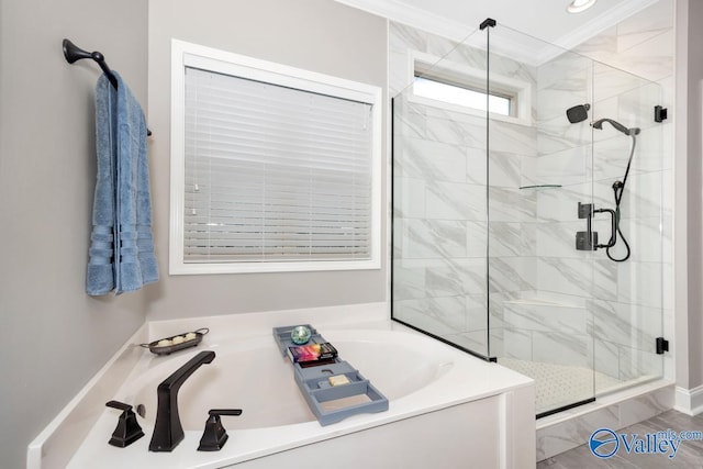 7528 Flint Crossing Cir, Owens Cross Roads, AL 35763 - full bath featuring a garden tub, crown molding, and a shower stall