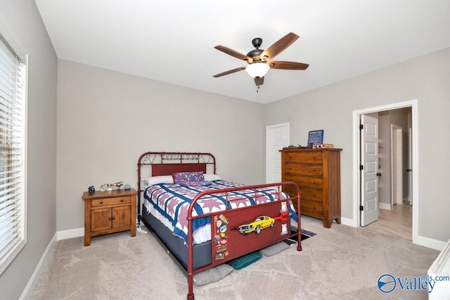 7528 Flint Crossing Cir, Owens Cross Roads, AL 35763 - bedroom featuring light carpet and a ceiling fan