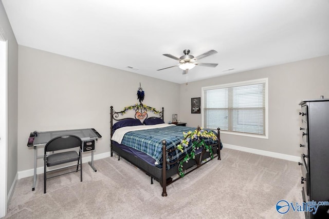7528 Flint Crossing Cir, Owens Cross Roads, AL 35763 - carpeted bedroom with baseboards and ceiling fan